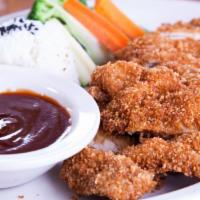 Chicken Katsu  · Panko breaded chicken, steamed vegetables, rice and topped with katsu sauce.