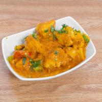 Karahi Chicken · Tender cubes of chicken simmered in sauce of fresh tomatoes and exotic herb.
