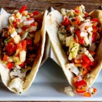 Vegan Tacos · White Corn Tortilla, quinoa, cauliflower rice, roasted pineapple salsa