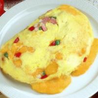 Western Omelette · Ham, red and green bell peppers, onions and cheddar cheese. 