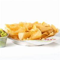 Chips & Guacamole · Individual portion of our wildly addictive chips & hand-mashed guacamole.
