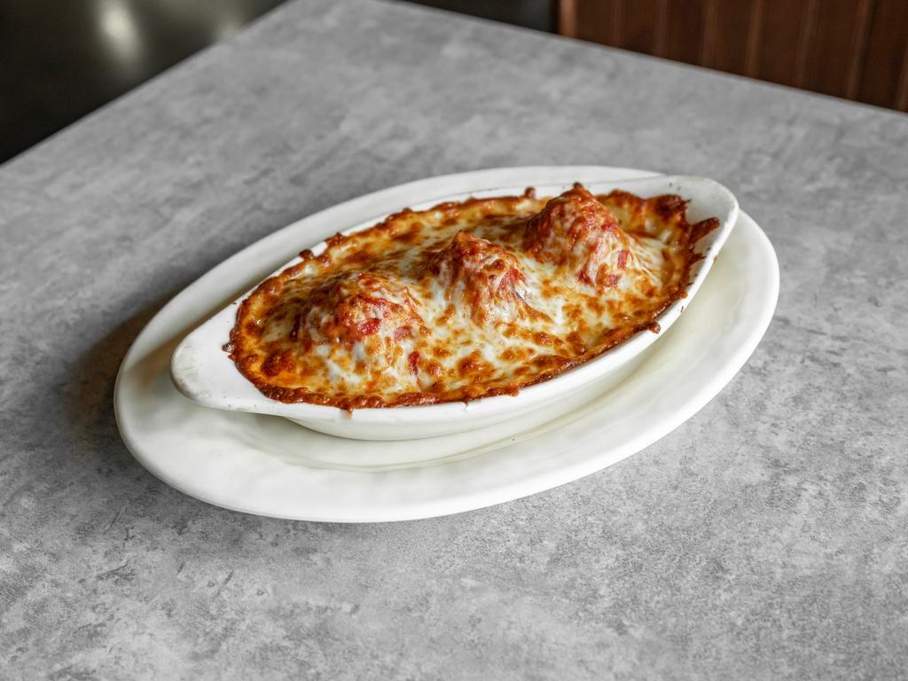 Baked Spaghetti · Regular. Our classic spaghetti topped with our delicious three cheese blend and baked to perfection.