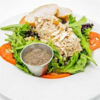 Tuna Salad Salad · Our house made Tuna salad served with tomatoes and snow peas on a bed of fresh mixed greens ...