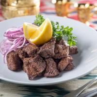 Turkish Liver · Fresh spiced veal liver fried and served with lemon and onions