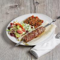 Lulya Kebab Plate · comes with a side of raw onion, rice, Greek salad and lavash