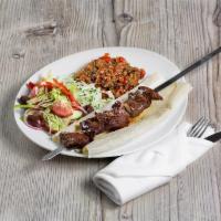 Beef Kebab Plate · comes with a side of raw onion, rice, Greek salad and lavash bread