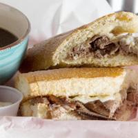 Lucky's French Dip Sandwich · Roast beef, provolone, a side of honey cream and au jus.
