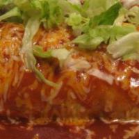 Wet Super Burrito · Beef or chicken, with rice, beans, tomatoes, cheese,  cilantro, and onion.