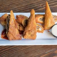 Cheese Steak Egg Rolls · Hand rolled and served with a side of homemade ketchup.