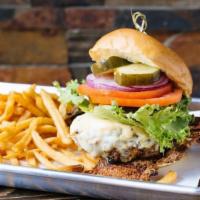 Bootlegger Burger · Black Angus burger with lettuce, tomato and onion. Served on a grilled brioche bun with a si...