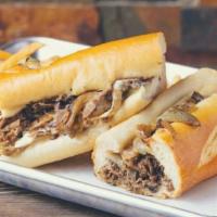 Cheese Steak WIT Moonshine · Classic philly cheese steak made with our signature provolone cheese sauce, American cheese ...