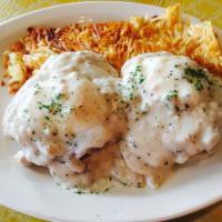 Country Benedict · 2 country sausage patties and 2 poached eggs topped with country sausage gravy.
