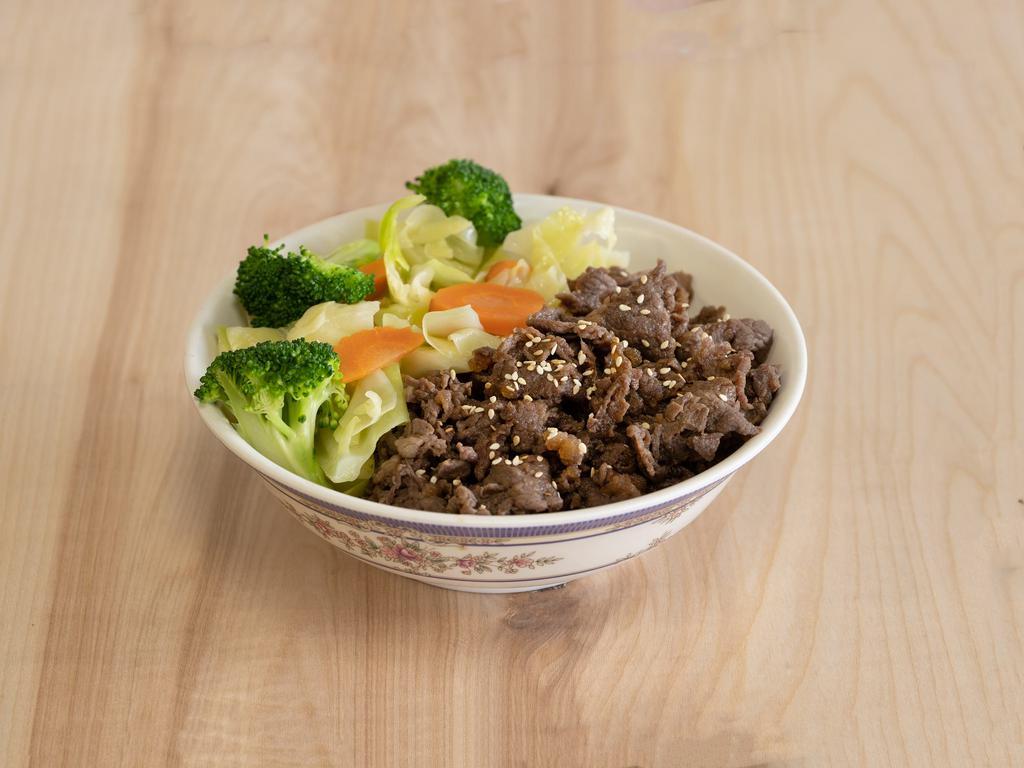 Teriyaki Beef Bowl · Thinly sliced beef served over rice and steamed vegetables. Served with steamed rice and vegetables.