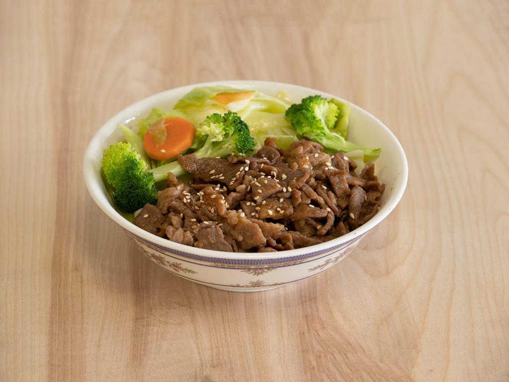 Teriyaki Pork Bowl · Thinly sliced pork served over rice and steamed vegetables.