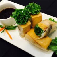 75. TOFU MUSHROOM ROLL · Tofu, mushroom, lettuce, mint wrapped in rice paper served with peanut sauce **CONTAINS PEAN...