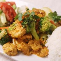 90. COCO CURRY - Soy Chicken · Coconut curry with soy chicken, bell pepper, onion, carrot, broccoli served with rice or ver...