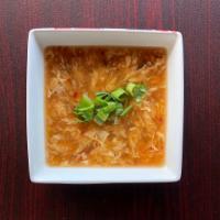 Hot & Sour Soup · Water-chestnuts, black mushrooms, Bamboo shoots, green onions and chicken.