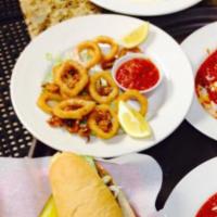 Fried Calamari · Lightly dusted and served with marinara sauce.