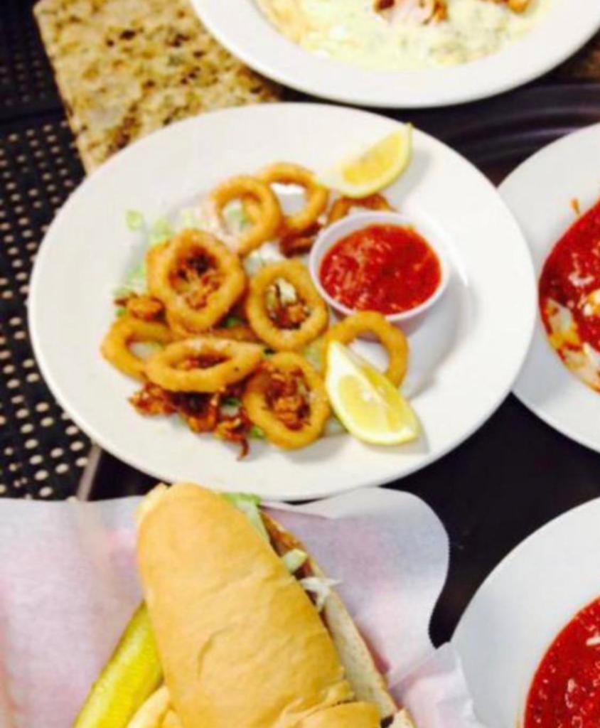 Fried Calamari · Lightly dusted and served with marinara sauce.