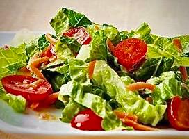 House Salad · Lettuce, tomatoes, feta cheese, kalamata olives, pepperoncini peppers with toasted dinner br...
