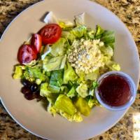 Greek Salad · Lettuce, tomatoes, feta cheese, kalamata olives, pepperoncini peppers with toasted dinner br...