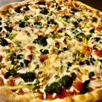 Veggie Pizza · Mushrooms, onions, black olives, green peppers, spinach, broccoli, fresh tomato, and extra c...