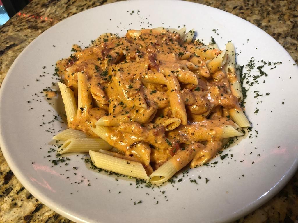 Pasta Rosato · Our tomato cream sauce tossed with your choice of pasta: Angel hair, fettuccine or penne.