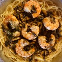 Shrimp Marsala · Spaghetti with shrimp, marsala sauce, garlic, and mushrooms.