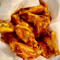 Wings · Include choice of hot, mild or BBQ, served with blue cheese or ranch dressing. Wings sauce a...