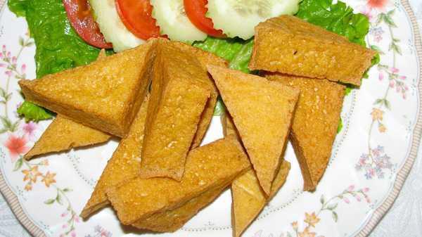 O. Fried Tofu · 8 pieces. Served with spring roll sauce (sauce contain peanuts).