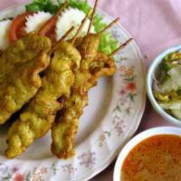 67. Chicken Satay · 5 sticks. Chicken satay, peanut sauce and cucumber sauce
