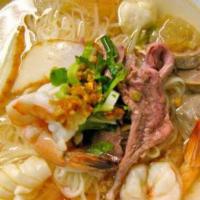 35. Special Pho Soup · Beef, imitation crab stick, shrimp, fish ball, and squid.