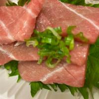 Toro Sashimi   · Served with tuna belly.