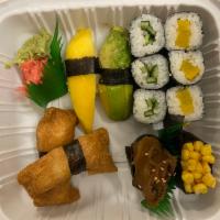 Veggie Sushi Sampler   · Served with nigiri 6 pieces inari, avocado, mango, shiitake mushrooms and corn.