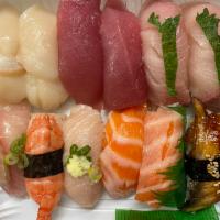 12 Pieces Nigiri   · 6 kinds fish 2 of each, free miso soup and green salad.