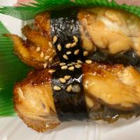 Unagi Nigiri  · Sushi laid top of rice.