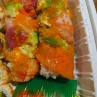 Rainbow Roll  · Assorted fish on California roll. Traditional roll.