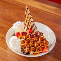 The Big Daddy · Waffle, brownie, upside down vanilla ice cream cone, magic chocolate shell, caramel, strawbe...
