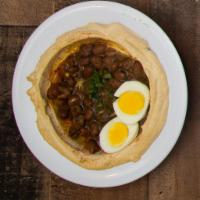 Fava Bowl · Hummus, tahini, fava beans, hard boiled egg and cumin. Served with pita bread and a side of ...