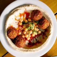 Falafel Bowl · Hummus, falafel balls and tahini sauce. Served with pita bread and a side of schug spicy sau...