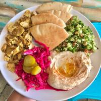 Grilled “Chicken” Shawarma platter · Your choice of meatless protein served with hummus,
tabbouleh salad, red cabbage and pita br...
