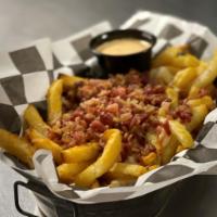 Bacon Cheese Fries · Topped with crisp bacon and white cheddar cheese. Served with Yummy Yummy Sauce.
