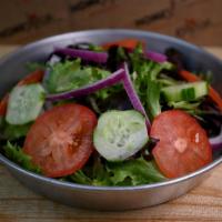 House Salad · Mixed greens, tomatoes, cucumbers, onions with your choice of dressing
