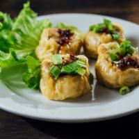 Shumai (Steam) · 6 Steamed lean ground chicken and shrimp dumplings topped with garlic and green onion. Serve...