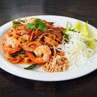 Drunken Noodles (Chicken) · Thick rice noodles with choice of protein & served with sprouts, green peppers, carrots, oni...