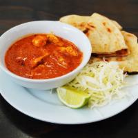 Roti Canai (Chicken) · Coconut curry with chicken and veggies. Curry is served with white cabbage lime & roti bread.