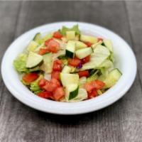 Side House Garden Salad · Mixed Lettuce, Tomatoes, Cucumbers, Onions, and your choice of Dressing