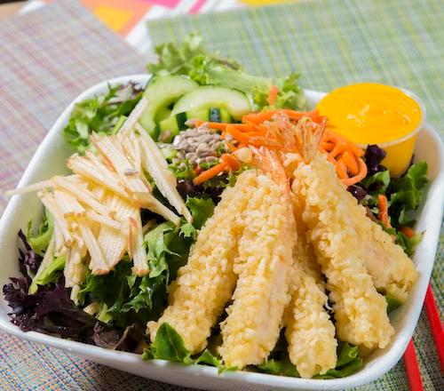 Shrimp Salad · Mixed greens topped with thinly sliced apples, carrots, pickled cucumbers, sunflower seeds, and 5pcs of shrimp tempura. All salads are served with house dressing