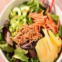 Garden Salad · Mixed greens topped with thinly sliced apples, carrots, pickled cucumbers, and sunflower see...