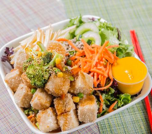 Fried Tofu Salad · Mixed greens topped with thinly sliced apples, carrots, pickled cucumbers, sunflower seeds, and a side of fried tofu (w/tofu sauce). All salads are served with house dressing